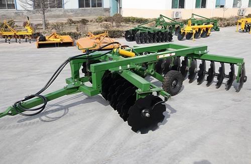 This picture shows a disc harrow. We offer a diverse range of agricultural machinery solutions.